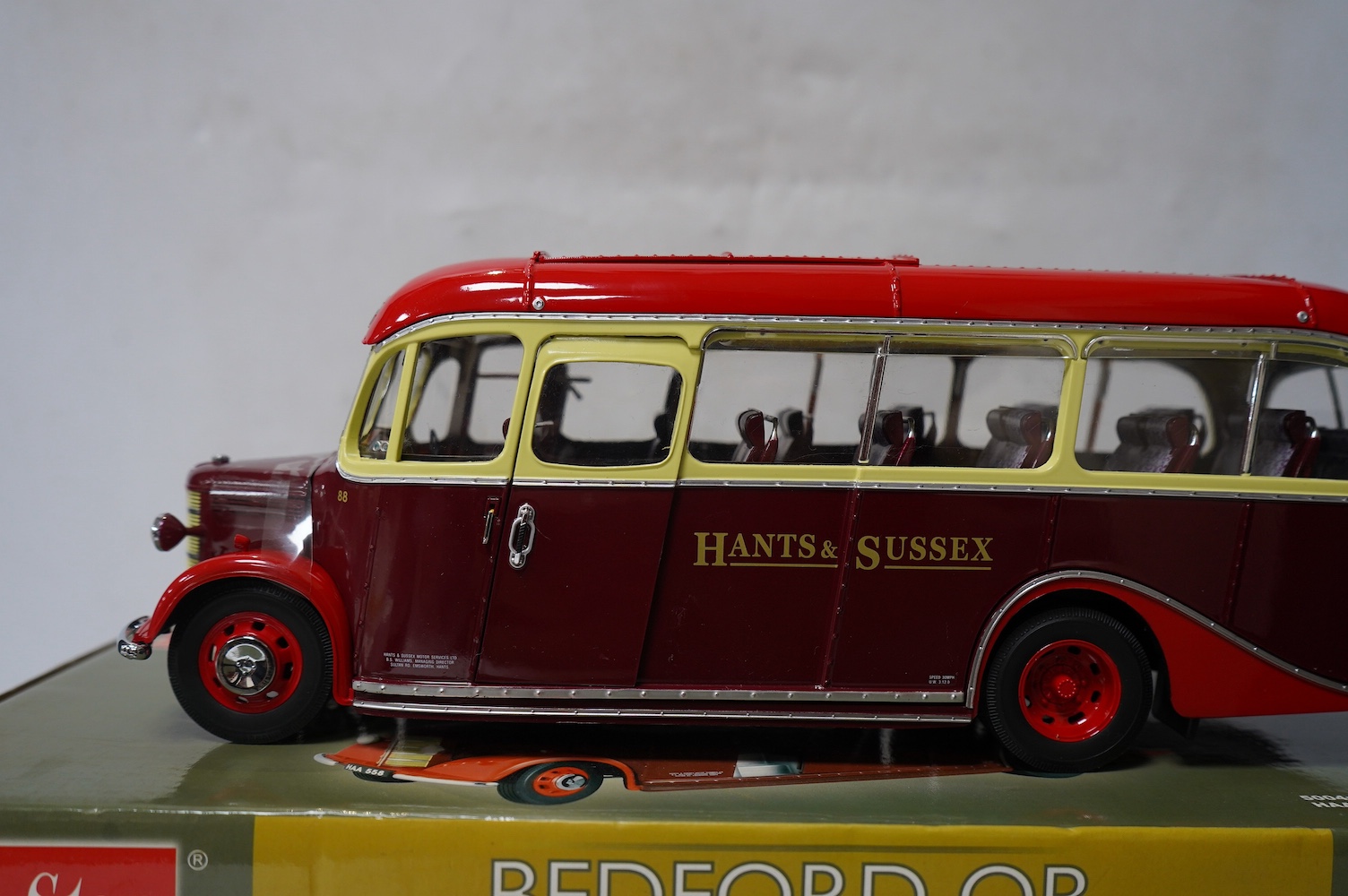 A boxed SunStar 1:24 scale Bedford OB Duple Vista coach, in Hants and Sussex delivery, with separate wing mirror and certificate. Condition - good, the model appears not to have been out on display.